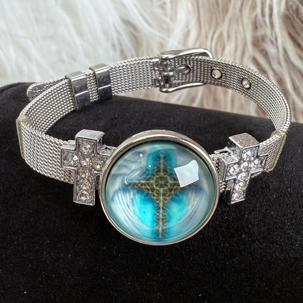 Silvertone Mesh Snap Bracelet with Blue Cross Design